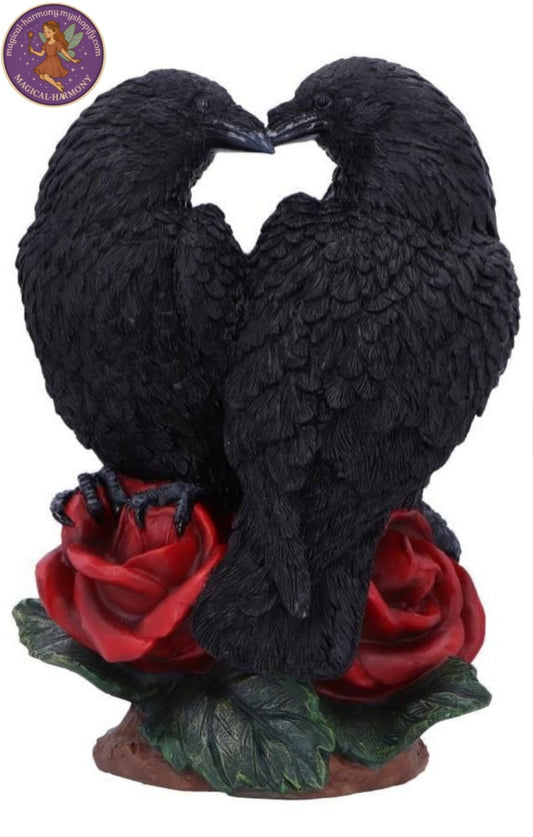 Black
Ravens figurine
Red rose base
Resin
20cm
The Raven Romance Figurine  is a detailed decorative resin figurine that captures the haunting beauty of love in the shadows. Two ravens, sculpted with lifelike precision, meet beak-to-beak.